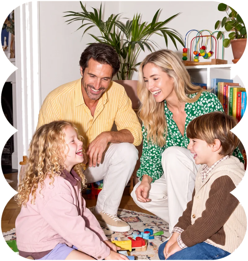 A family laughing together at home
